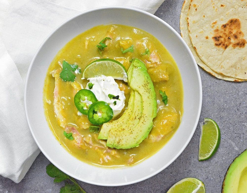 Mexican chili verde in a white bowl.