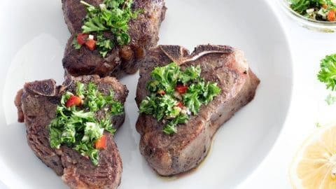 3 Sous Vide Lamb Chops topped with mint chimichurri.