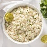 Cilantro lime rice in a white bowl.