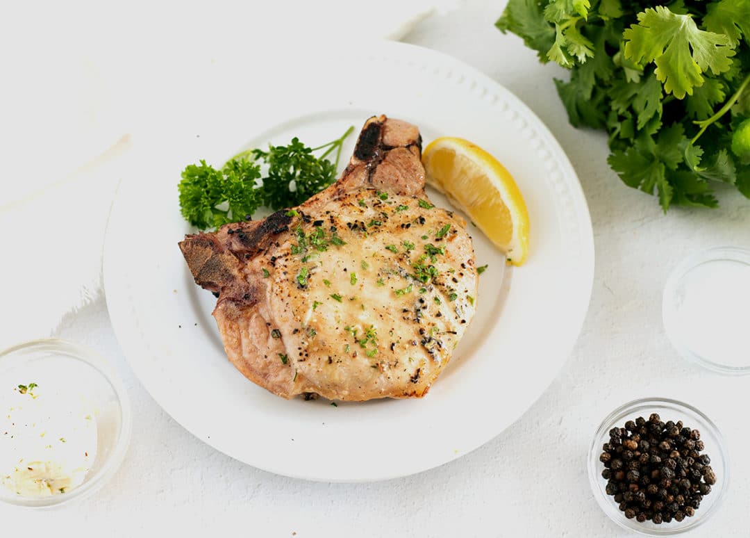 The Best Smoked Pork Chops With Garlic Herb Butter