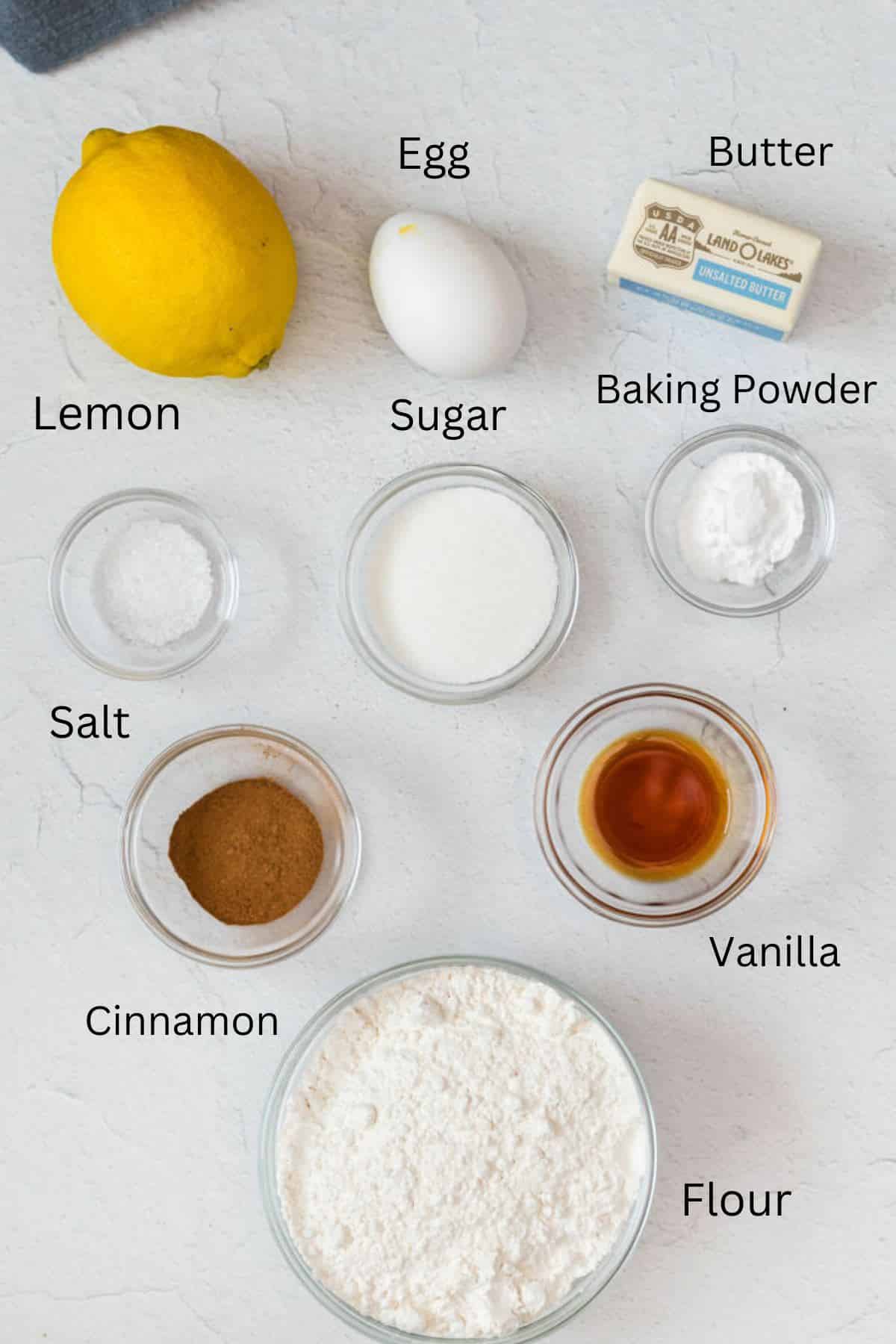 Various baking ingredients in small glass bowls.