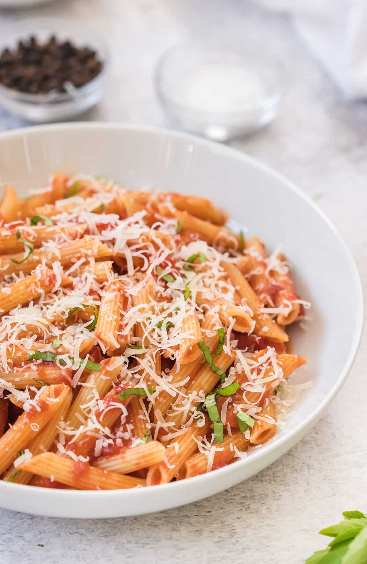 pasta penne in a white bowl