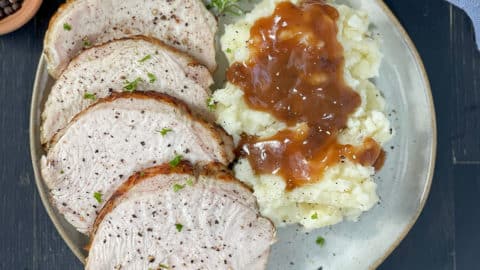Sous vide turkey breast plated with mashed potatoes.
