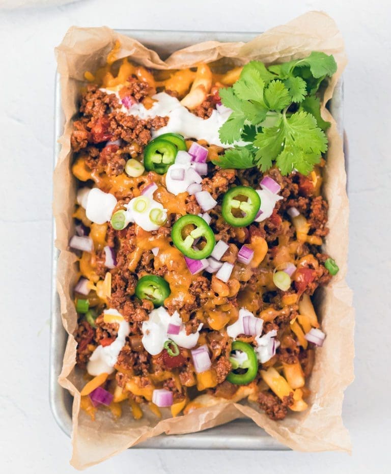 Overhead shot of loaded potato wedges.