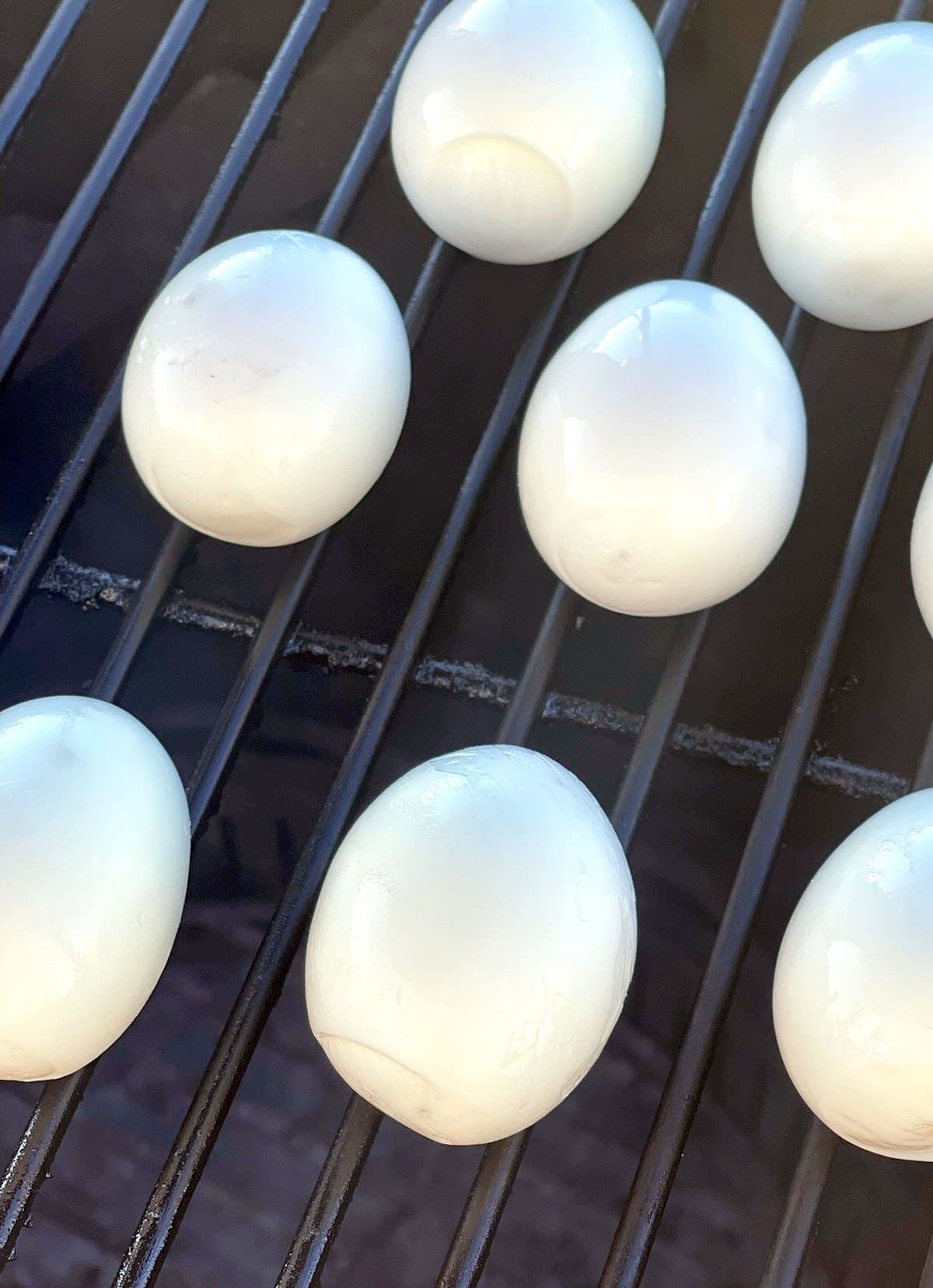 Hard boiled eggs on a grill.