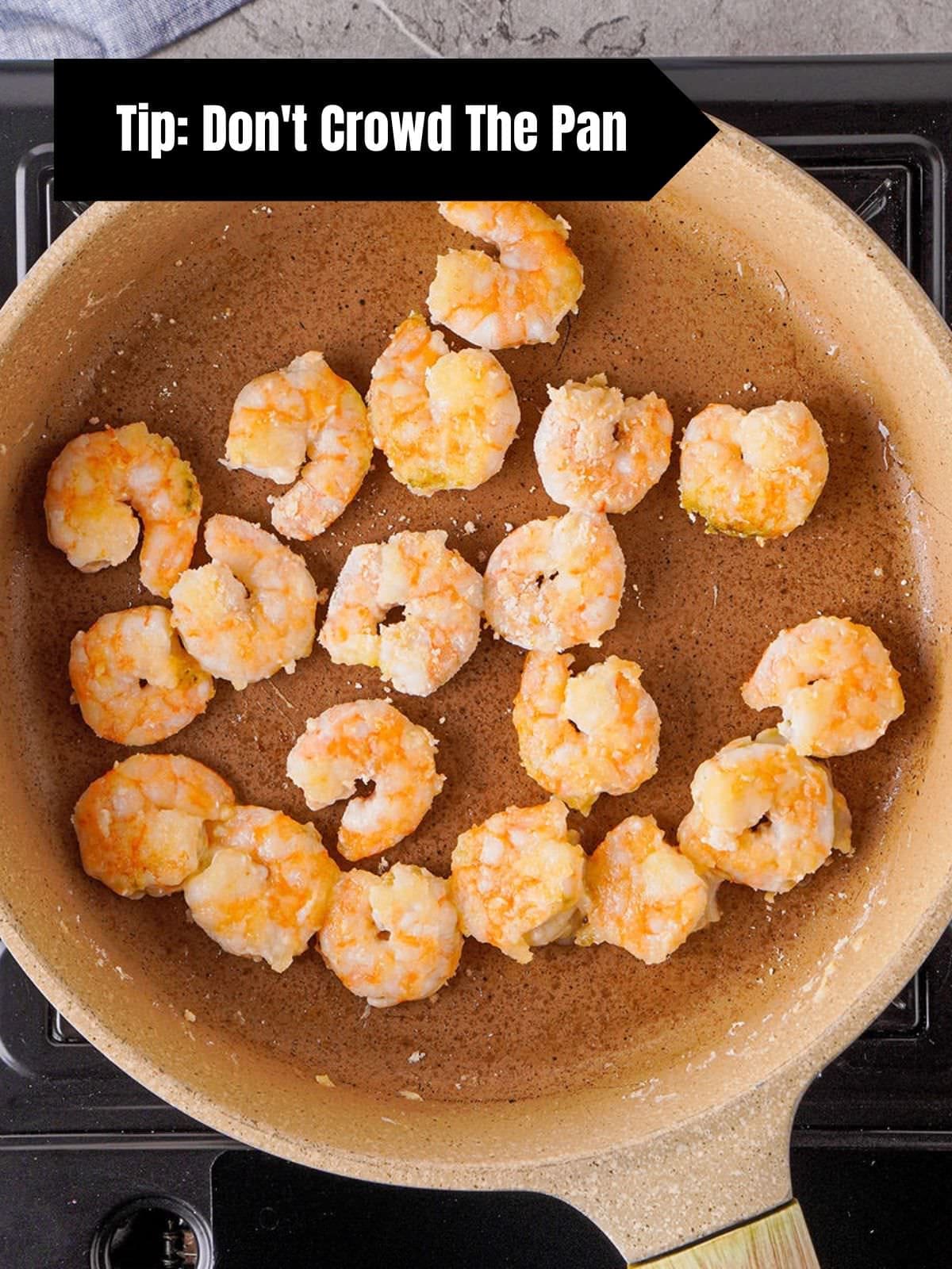 Stir-fried shrimp with text "Tip: Don't Crowd The Pan."