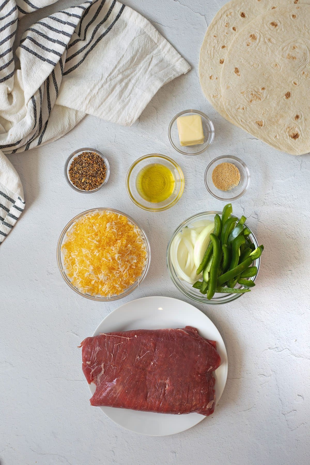 Ingredients to make a beef quesadilla.