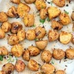 Sheet pan covered with roasted Mexican potatoes.