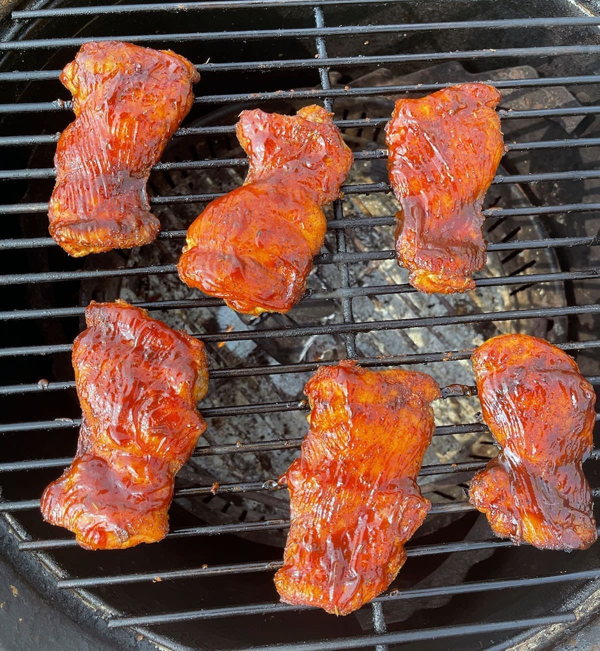 BBQ Smoked Chicken on the grill.