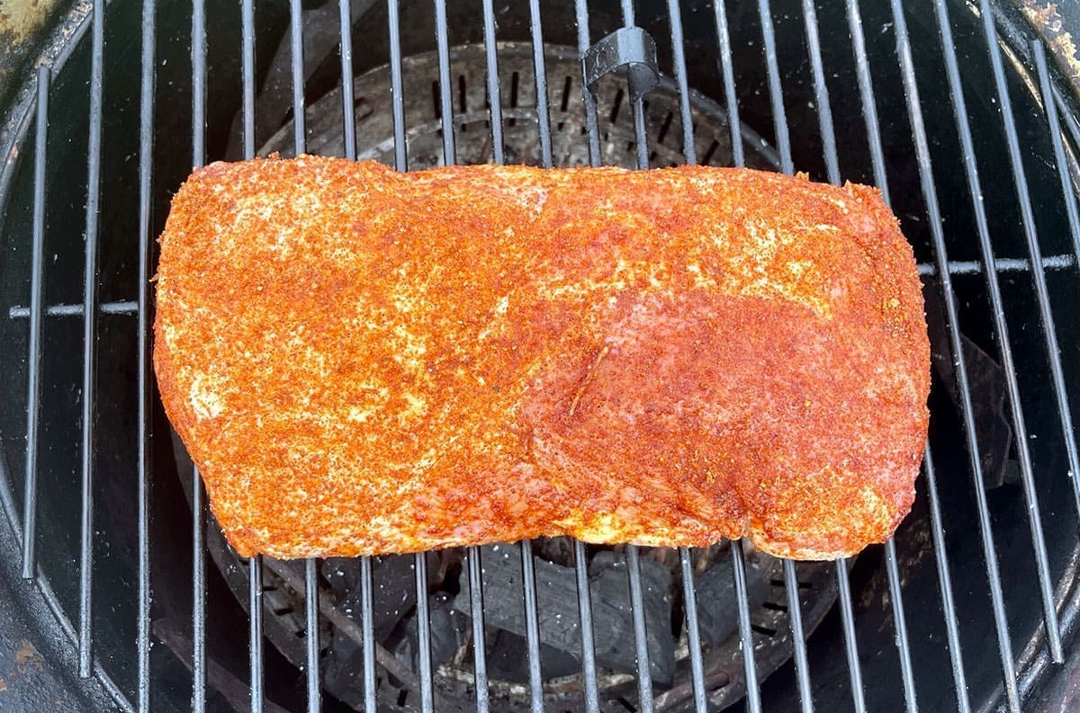 BBQ pork loin on a grill.