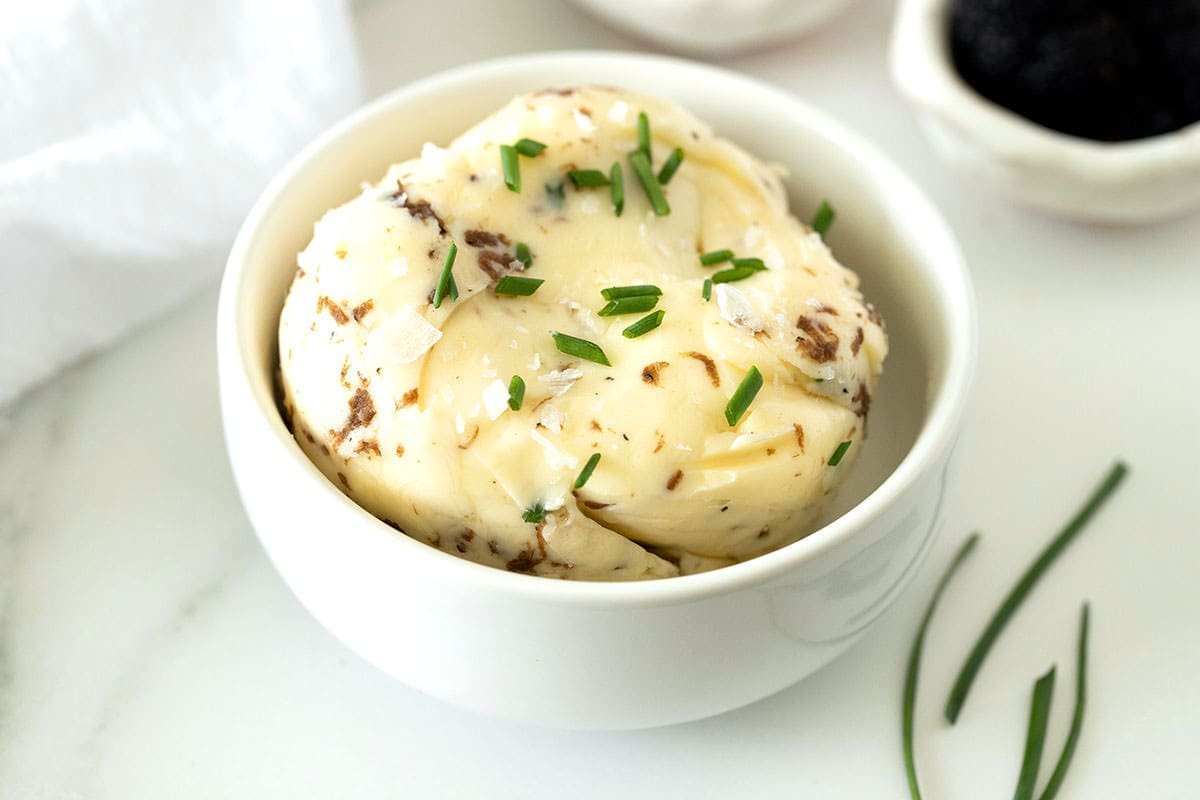Truffle butter in a small white bowl.