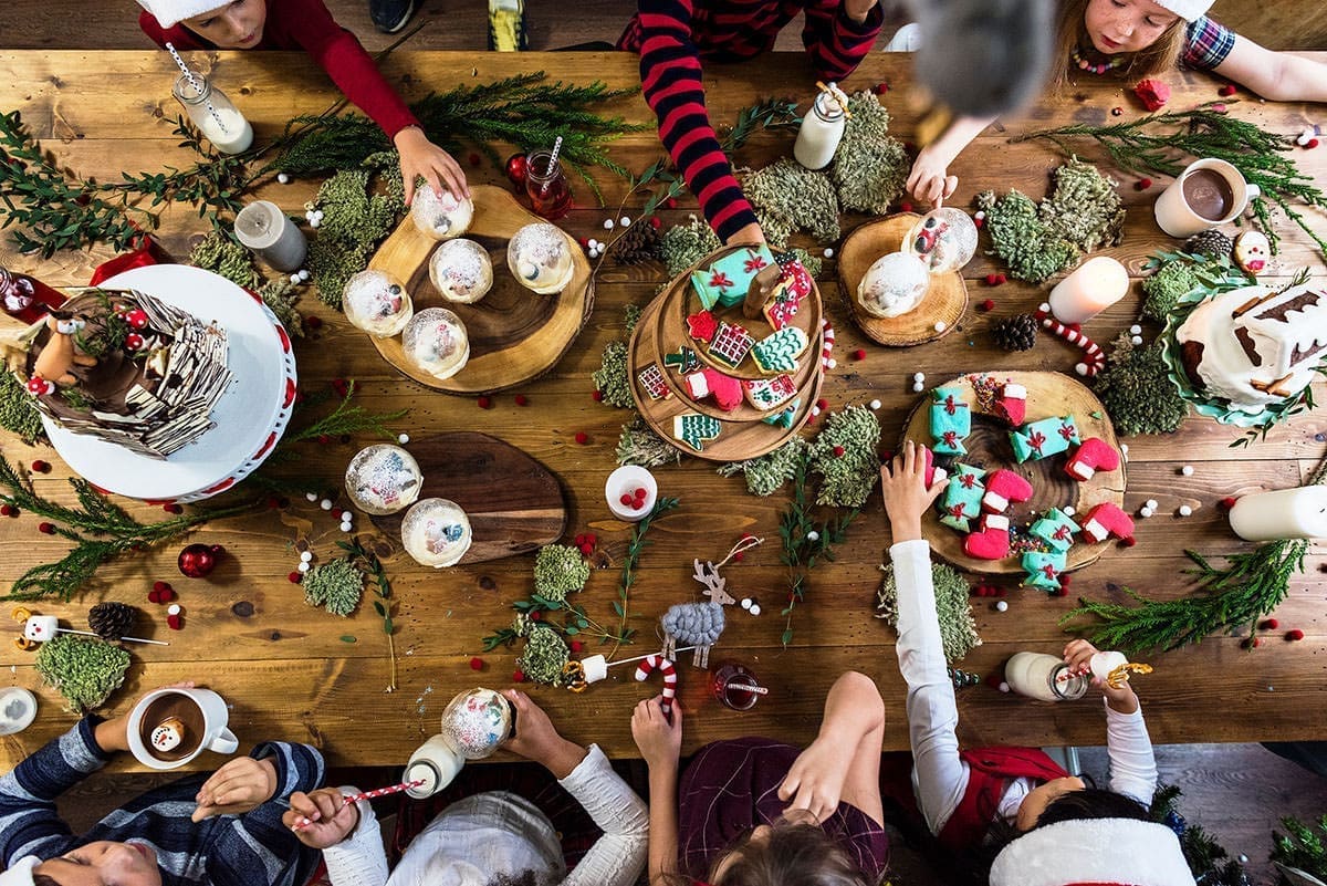 Picture of a cookie exchange for a Christmas Party Themes post.