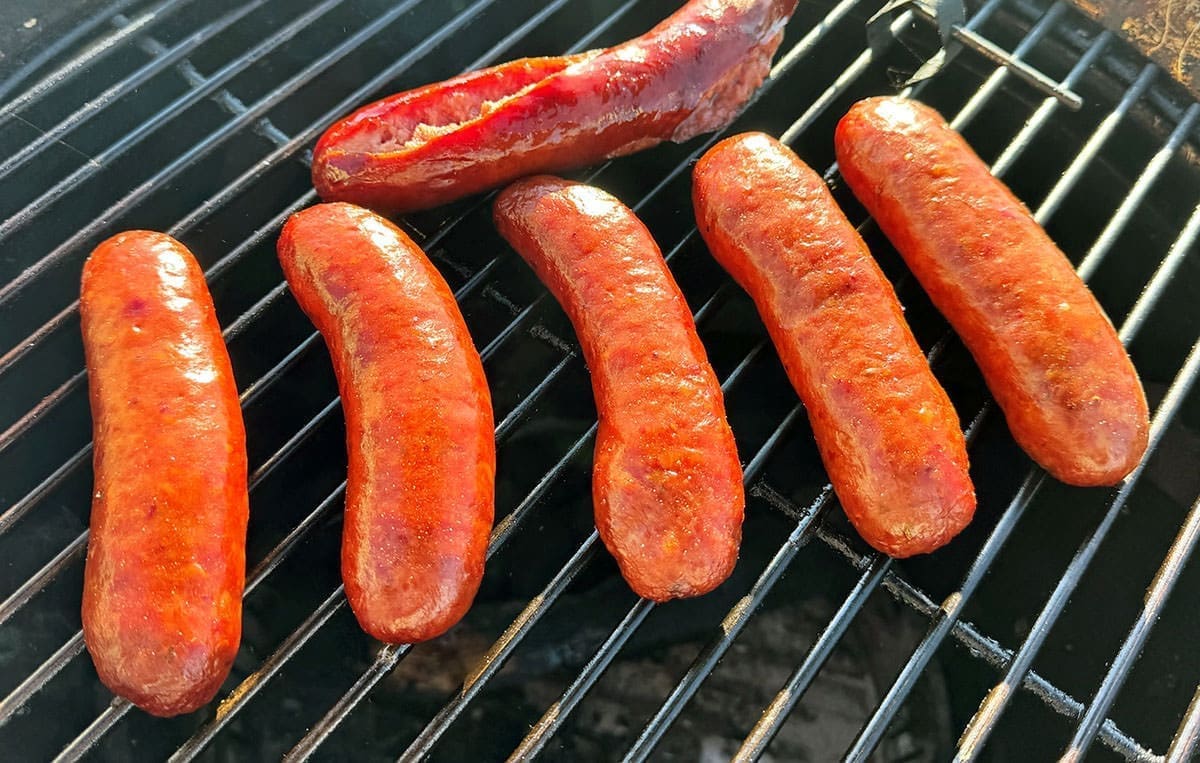 Sausage links on a grill.