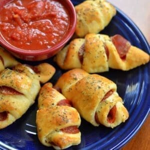 Pigs in a blanket with pizza sauce.
