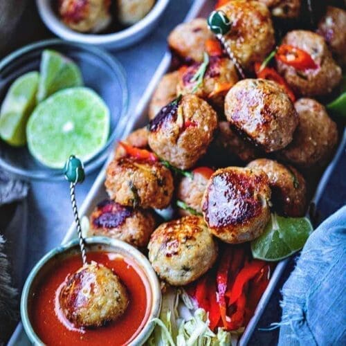 Tom Yum meatballs with dipping sauce.
