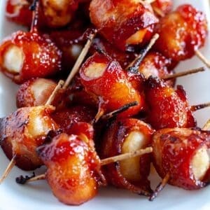 bacon wrapped water chestnuts with toothpicks.