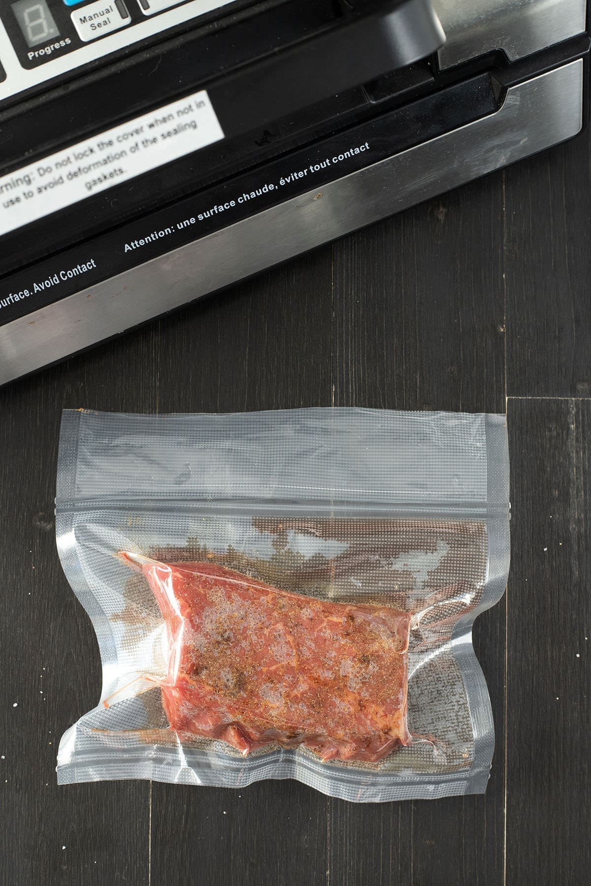 Steak in a vacuum sealed bag. 