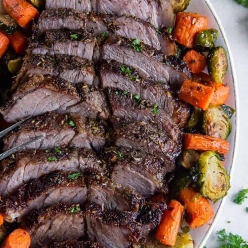30+ Beef Chuck Roast Recipes 3 Air Fryer Chuck Roast sliced on a platter.