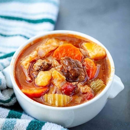 30+ Beef Chuck Roast Recipes 16 Borscht soup in a small white serving bowl.