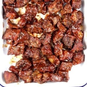 30+ Beef Chuck Roast Recipes 31 Poor mans burnt ends on a white dish.