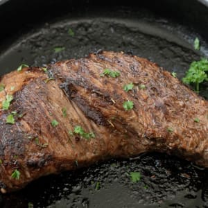 Oven baked tri tip in a cast iron skillet.