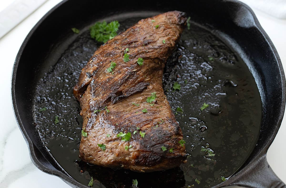 Baked Beef Tri Tip on a cast iron skillet.