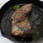 oven baked tri tip in a cast iron skillet.