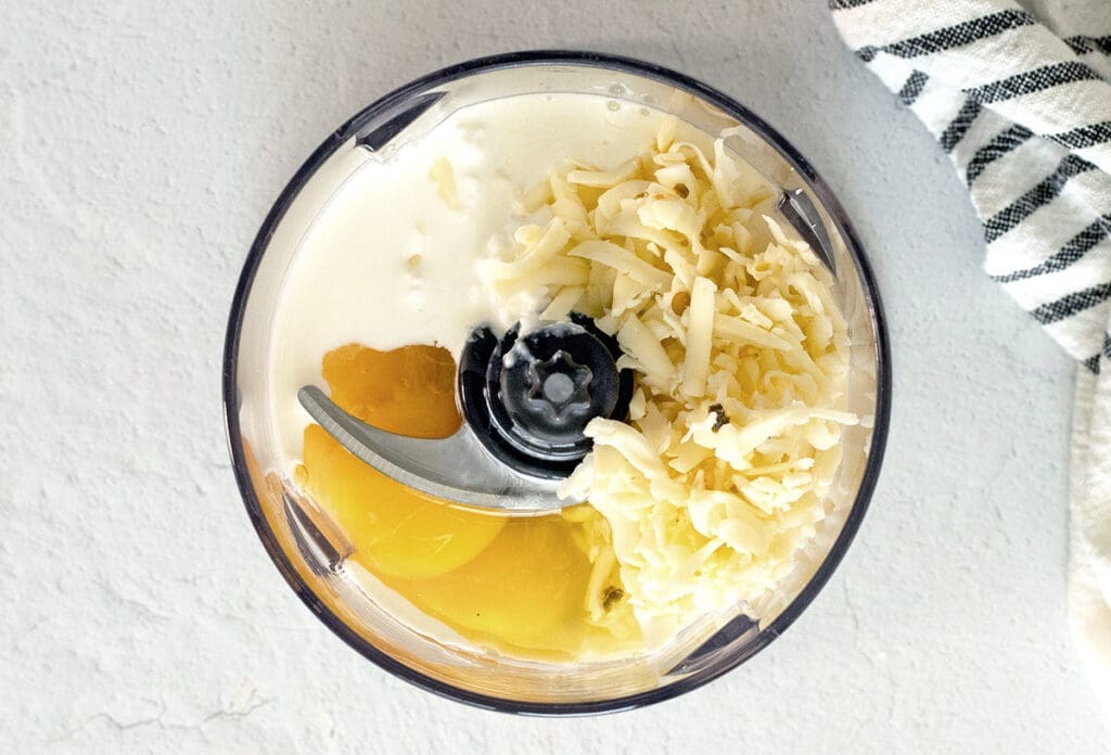 Eggs, cheese and heavy cream in a blender.