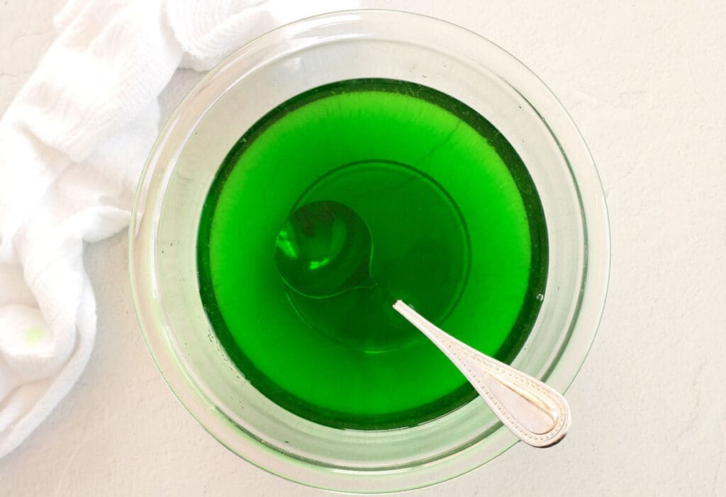 Bowl of green liquid.