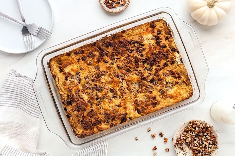 Pumpkin Dump Cake in a clear baking pan. 