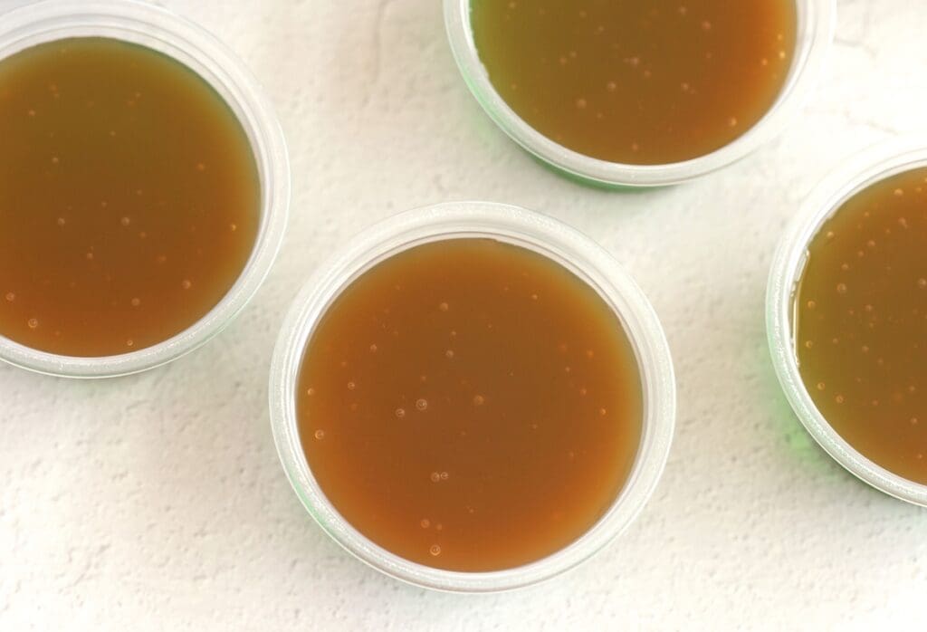 caramel in plastic cups.