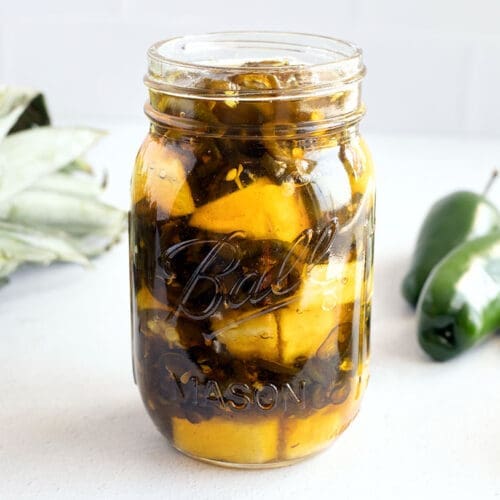 Cowboy candy with pineapple in a mason jar.