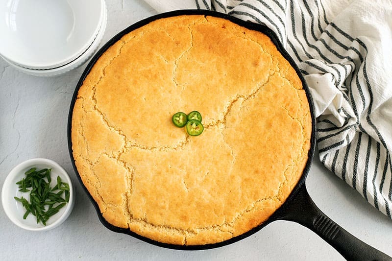 Cowboy Cornbread Casserole in a skillet.