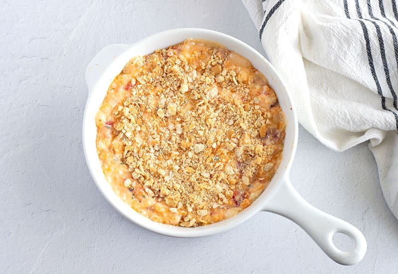 Cheese Dip in a white baking dish.