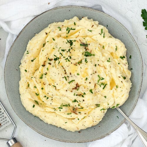 Blue plate with truffle mashed potatoes.