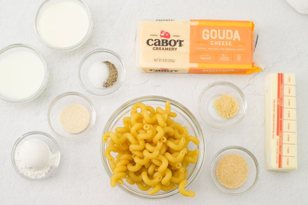 Individual ingredients to make gouda macaroni and cheese.