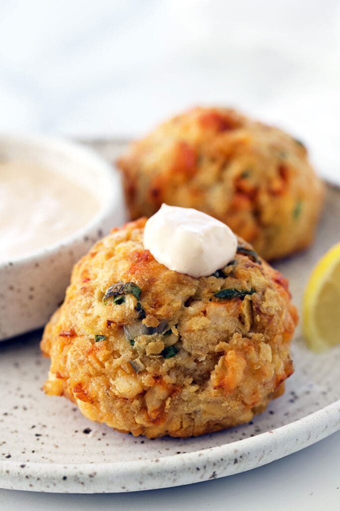 Lobster cake topped with seafood soaked sauce.