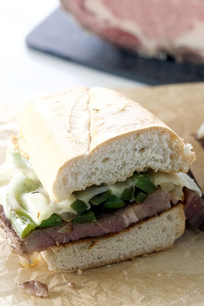 Cut sandwich on parchment paper.