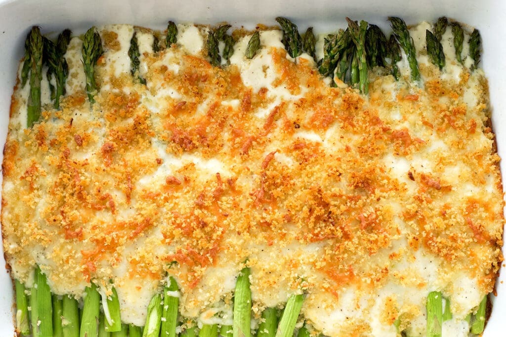 close up of cooked cheese and vegetables.