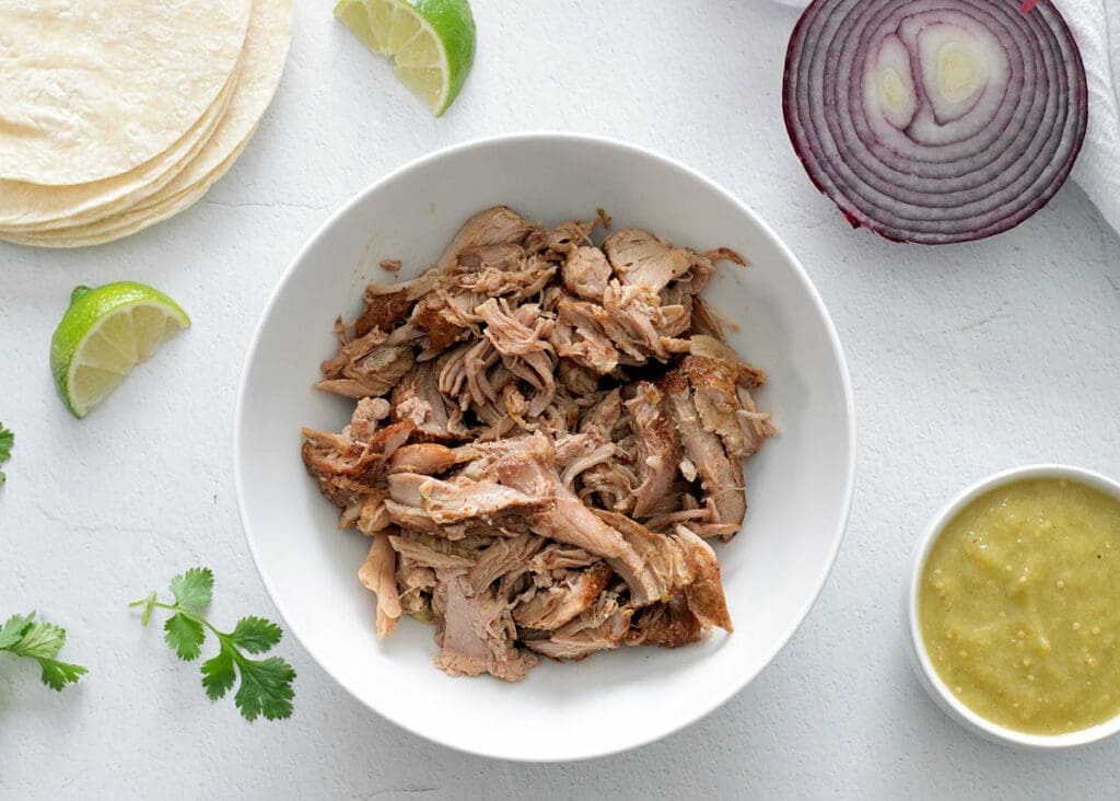 Photo of the ingredients needed to make carnitas tacos.