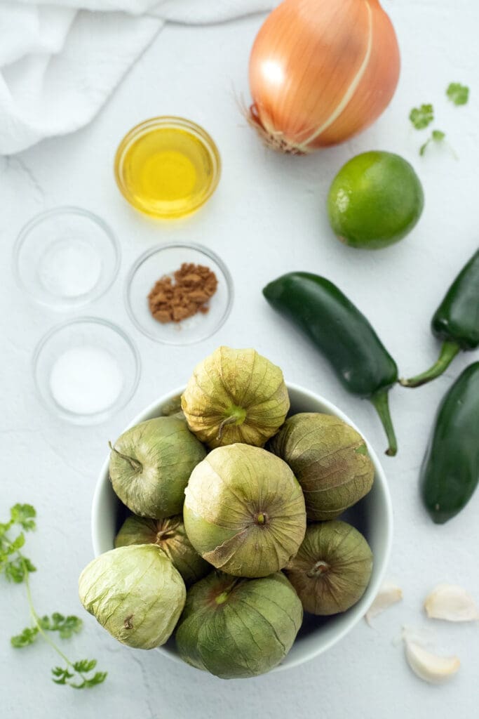 Tomatillos, peppers and onions to make tomatillo salsa.