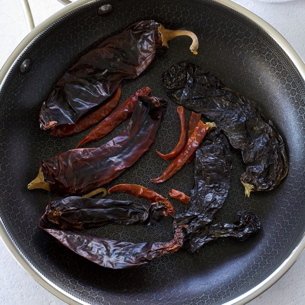 Skillet of a variety of dried chiles.