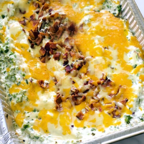 Aluminum pan with smoked jalapeno popper dip.